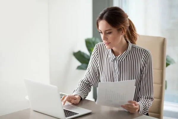 a woman using a laptop